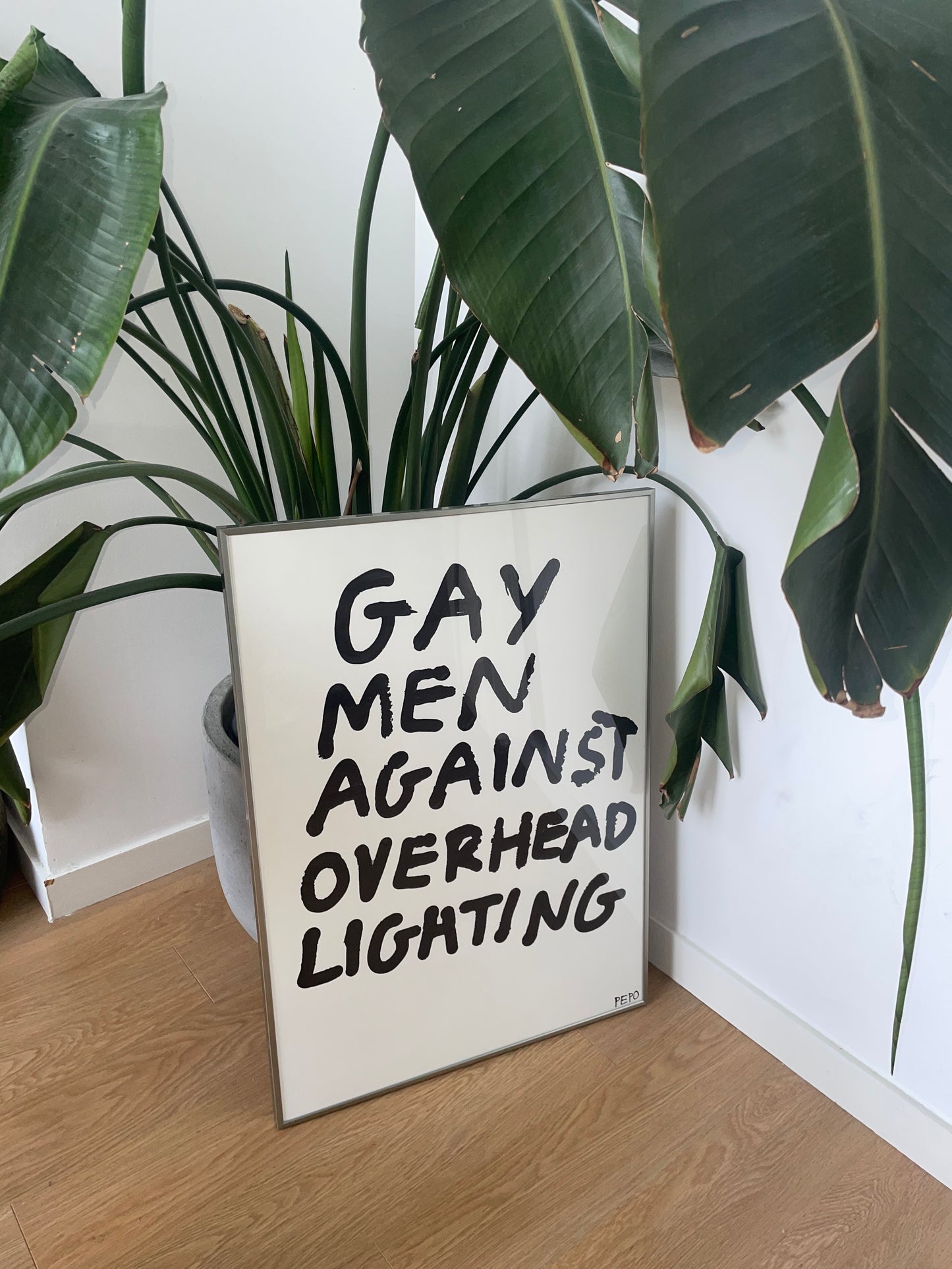 GAY MEN AGAISNT OVERHEAD LIGHTING - PRINT - 50X70 CM