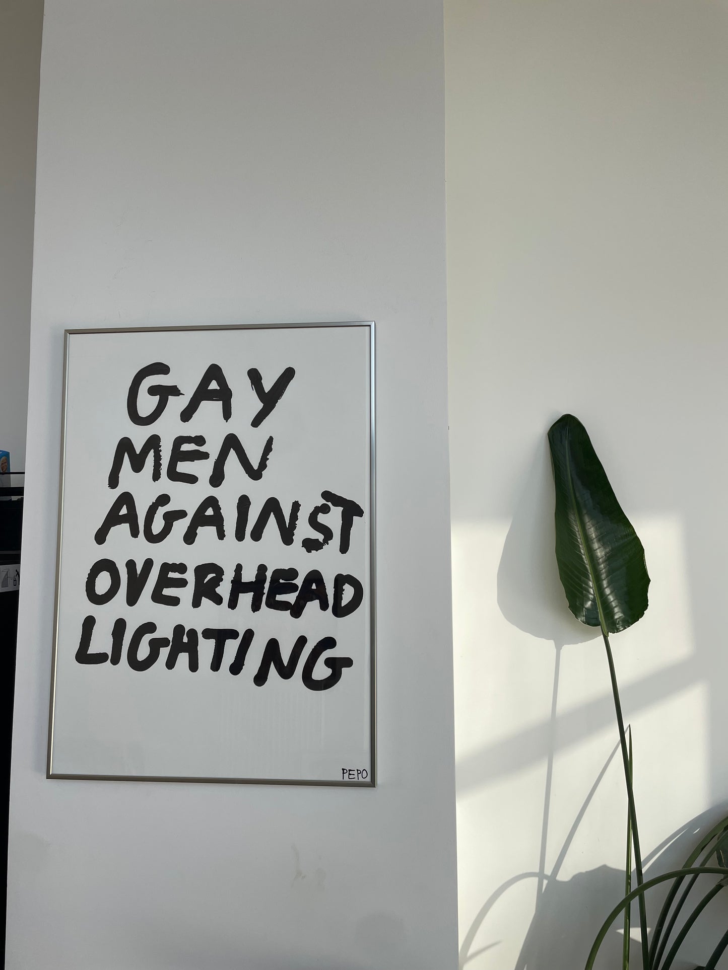 GAY MEN AGAISNT OVERHEAD LIGHTING - PRINT - 50X70 CM